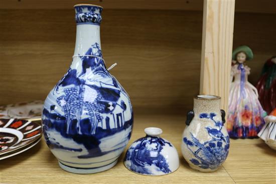 An 18th century blue and white guglet and a Guangxu brushwasher and a small crackle vase